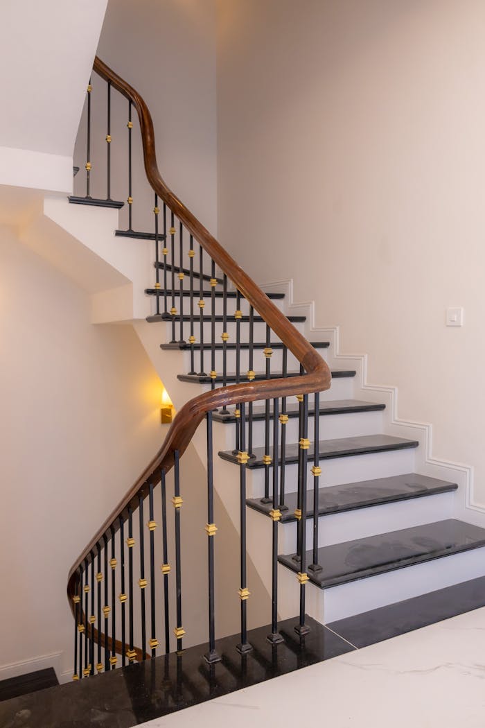 Crafting Captivating Headlines: Your awesome post title goes here Beautiful spiral staircase with a wooden handrail and sleek design indoors.